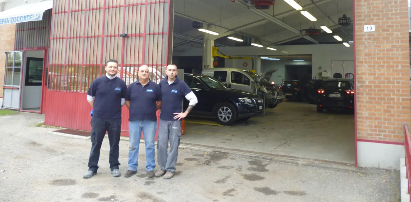 The Carrozzeria Zoccadelli team outside their workshop